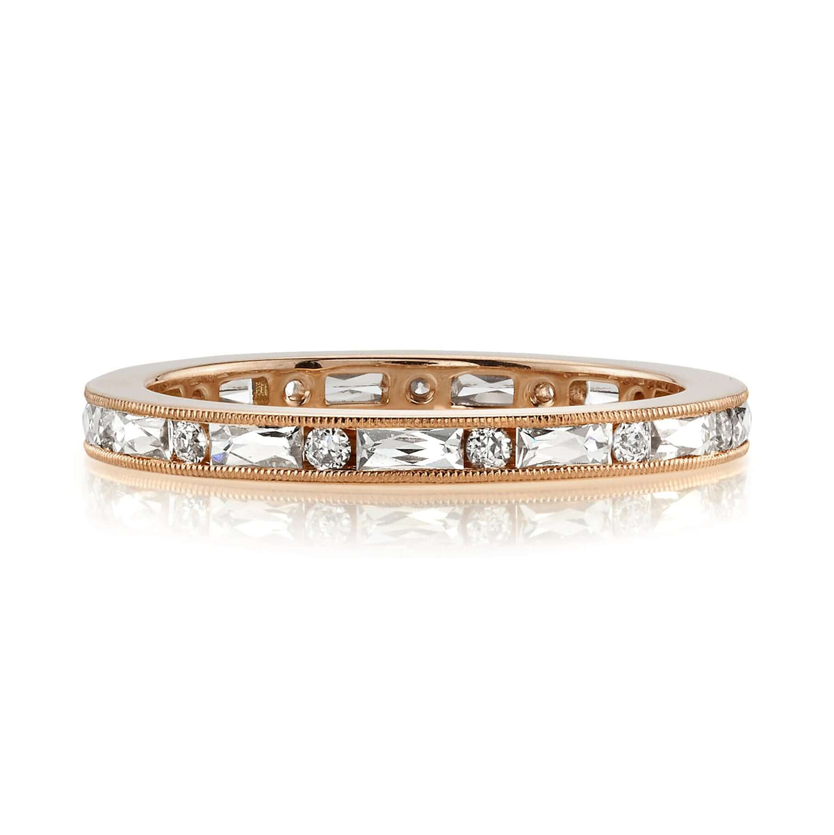 SINGLE STONE PAIGE BAND | Approximately 0.75ctw G-H/VS alternating French and old European cut diamonds channel set in a handcrafted eternity band. Approximate band with 2.1mm. Please inquire for additional customization.