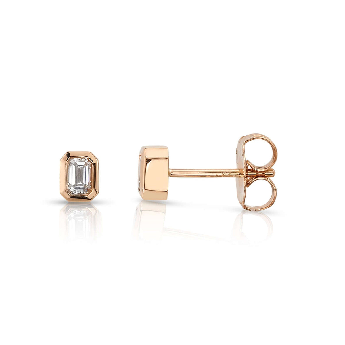 SINGLE STONE SIERRA STUDS | Earrings featuring Approximately 0.18ctw G-I/VS emerald cut diamonds bezel set in handcrafted stud earrings.