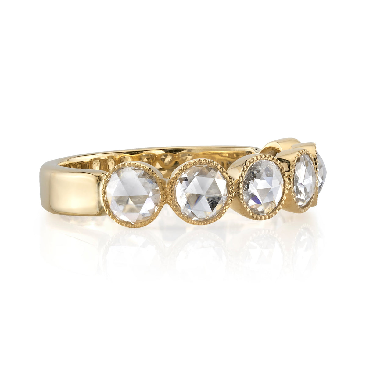 SINGLE STONE LARGE ROSE CUT GABBY HALF BAND BAND | Approximately 0.90ctw rose cut diamonds set in a handcrafted bezel set half-eternity band. Approximate band width 4.8mm. Please inquire for additional customization.