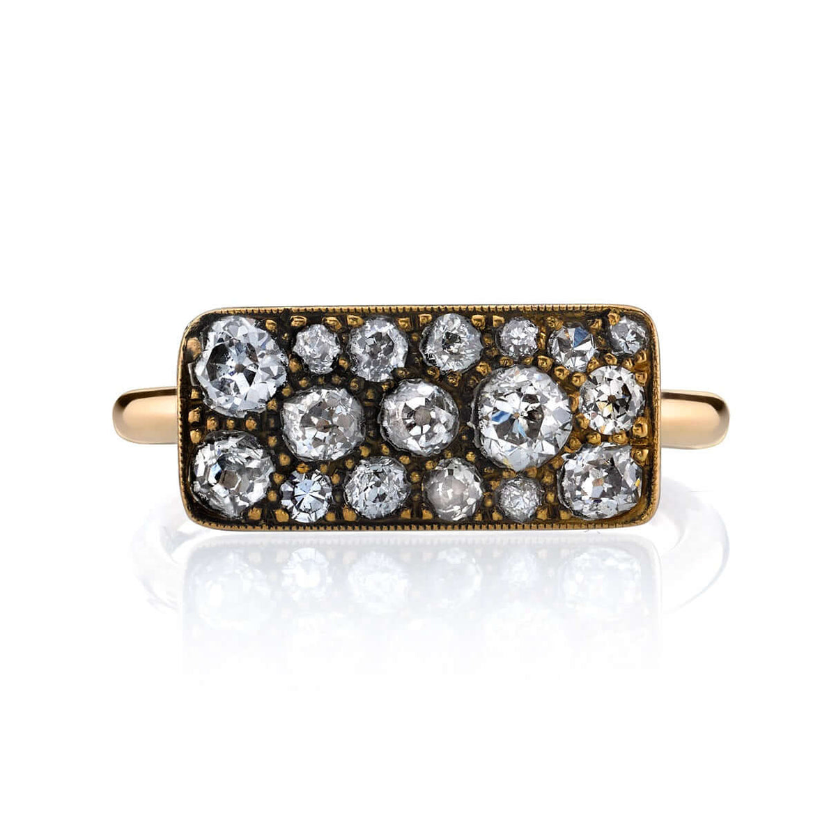 SINGLE STONE MILO COBBLESTONE RING RING featuring 0.95ctw various old cut and round brilliant cut diamonds set in a handcrafted 18K yellow gold mounting. Price may vary according to total diamond weight. *Cobblestone pattern may vary from piece to piece