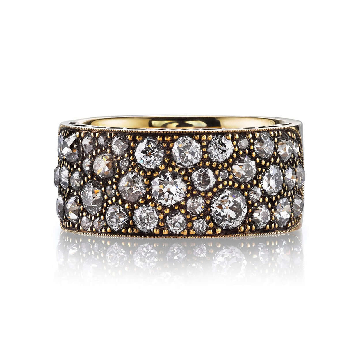 SINGLE STONE COBBLESTONE BAND BAND | Approximately 2.25ctw varying old cut and round brilliant cut diamonds set in a handcrafted 18K yellow gold band. Approximate band width 8.9mm. *Cobblestone pattern may vary from piece to piece Please inquire for addit