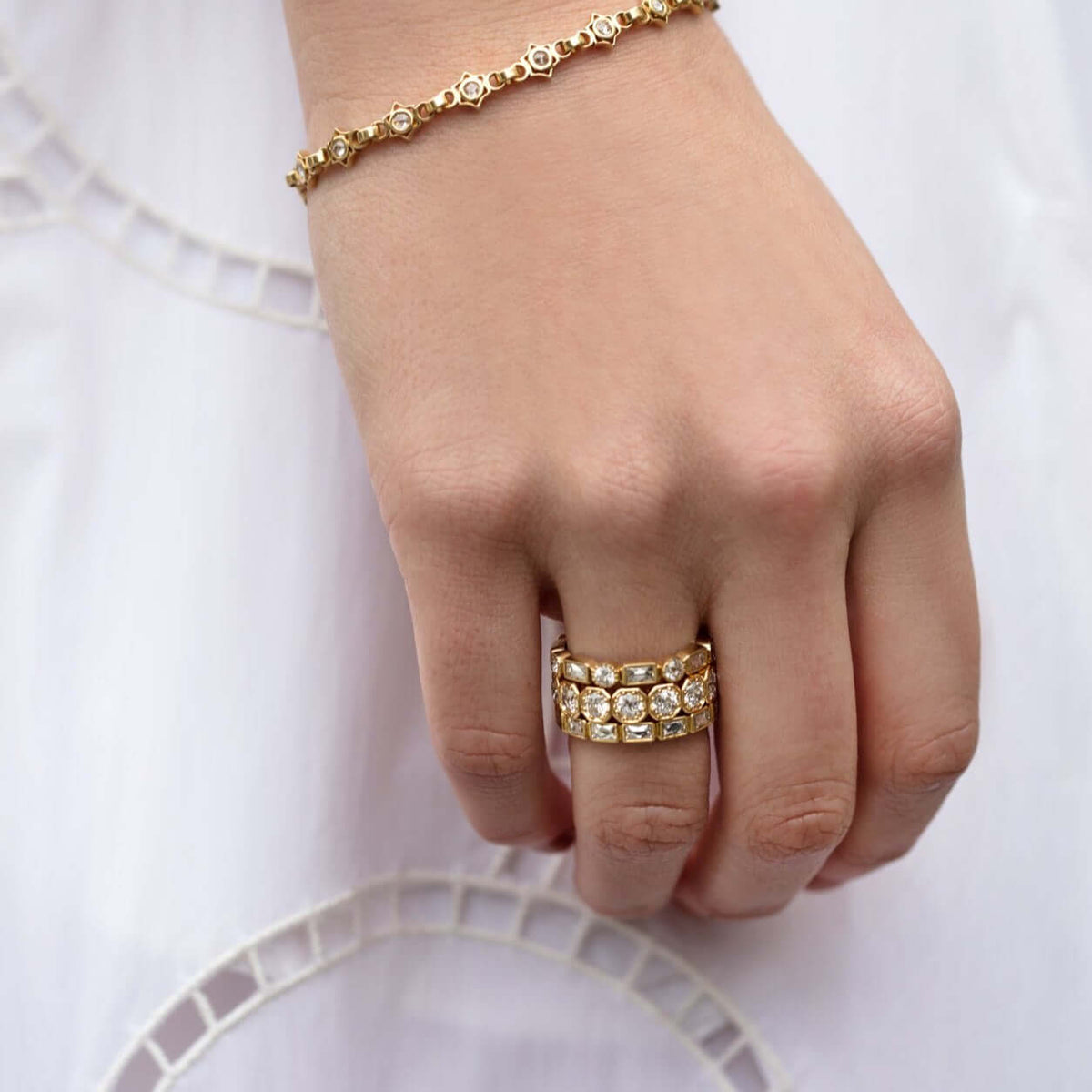 SINGLE STONE LARGE JULIA BAND | Approximately 1.30-1.60ctw G-H/VS French cut diamonds bezel set in a handcrafted eternity band. Approximate band width 3mm. Please inquire for additional customization.
