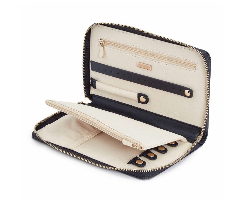 MARIA JEWELRY PORTFOLIO, Material: Leather
Storage: 1 earring tab, 1 ring tab, 2 zip compartments, 4 snap-on necklace hooks with pocket
LusterLoc™: Allows the fabric lining the inside of your jewellery cases to absorb the hostile gases known to cause tarnishing. Under typical storage conditions, it can prevent tarnishing for up to 35 years
8.75" L X 5.25" W X 1.25" H
, Gifts, WOLF DESIGNS, INC