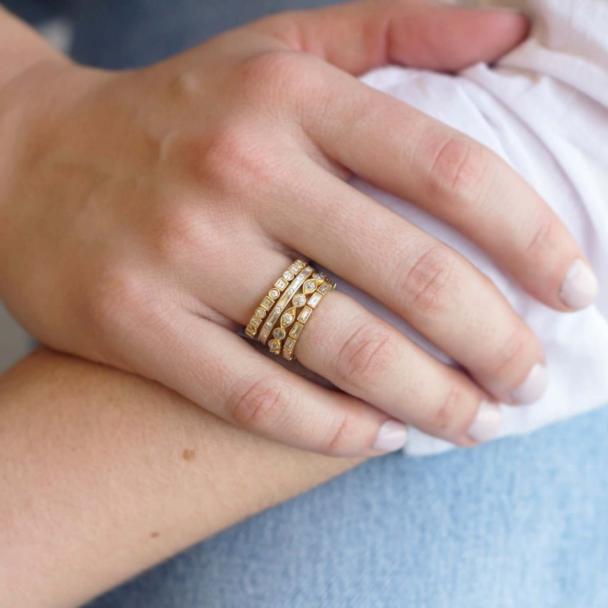 SINGLE STONE ADDIE BAND | Approximately 0.95ctw G-H/VS carré and old European cut diamonds set in a handcrafted eternity band. Approximate band width 2.6mm. Please inquire for additional customization.