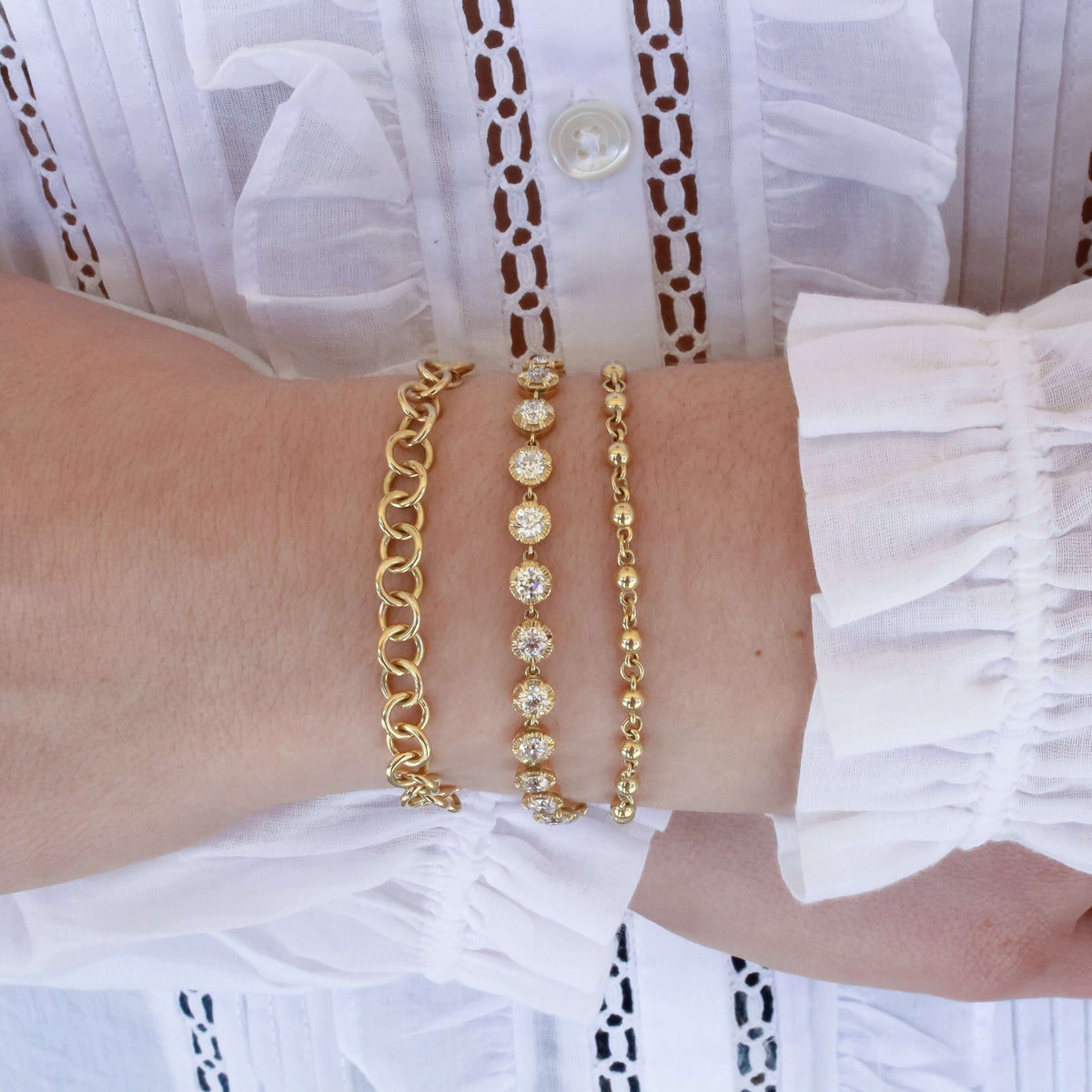SINGLE STONE ARIELLE BRACELET featuring 4.82ctw G-H/VS-SI old European cut diamonds set in a handcrafted 18K yellow gold diamond tennis bracelet.