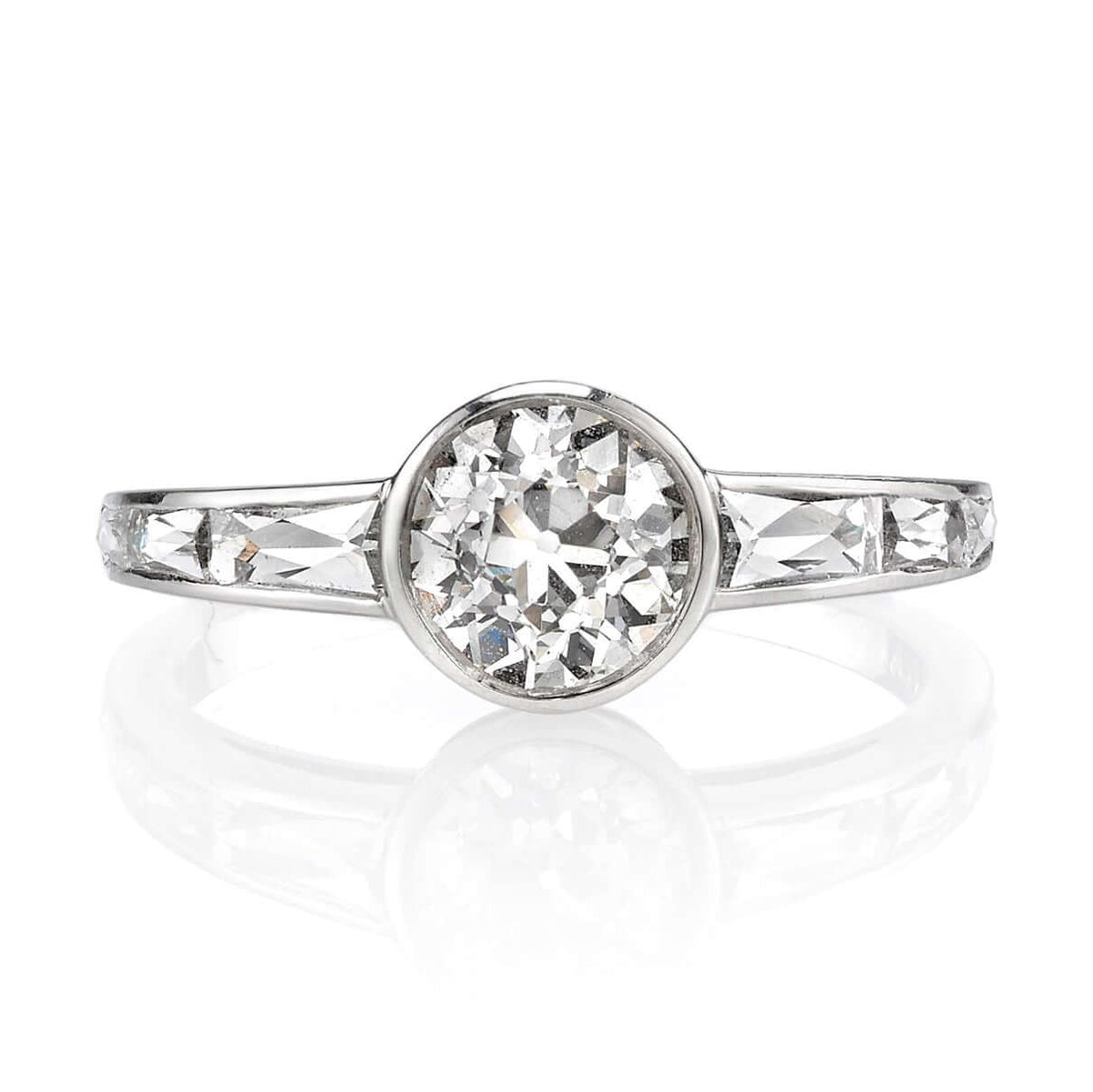 SINGLE STONE CHRISTINA RING featuring 1.04ct K/VS2 GIA certified old European cut diamond with 0.60ctw French cut accent diamonds set in a handcrafted platinum mounting.