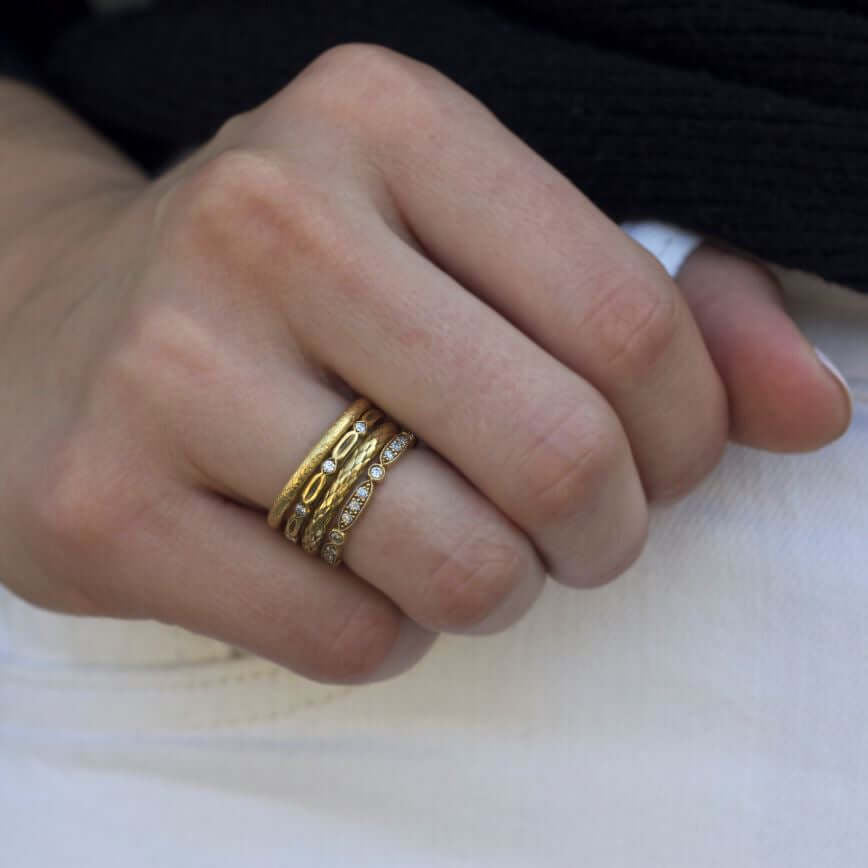 SINGLE STONE KENNEDY BAND | Approximately 0.20ctw single cut diamonds set in an oxidized, handcrafted 18K gold eternity band. Approximate band width 2mm. Please inquire for additional customization.