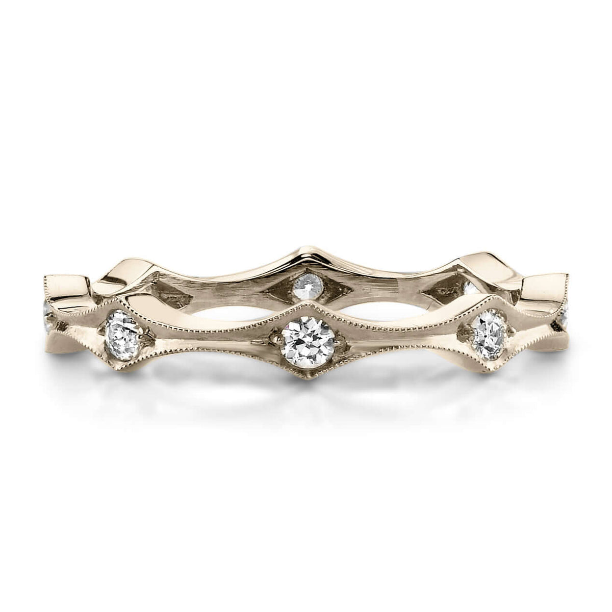 SINGLE STONE DIANA BAND | Approximately 0.50ctw old European cut diamonds set in a handcrafted eternity band. Approximate band width 3mm. Please inquire for additional customization.