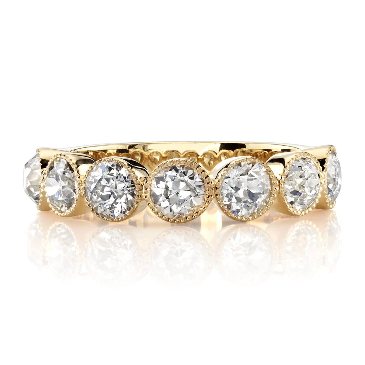 SINGLE STONE LARGE GABBY HALF BAND BAND | Approximately 1.50-1.70ctw old European cut diamonds set in a handcrafted bezel set half-eternity band. Approximate band width 4.8mm.
