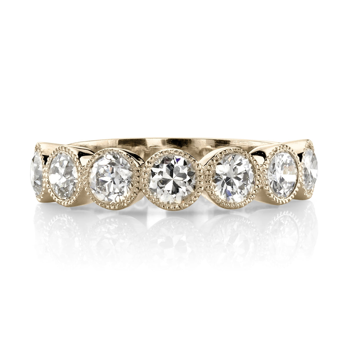 SINGLE STONE LARGE GABBY HALF BAND BAND | Approximately 1.50-1.70ctw old European cut diamonds set in a handcrafted bezel set half-eternity band. Approximate band width 4.8mm.