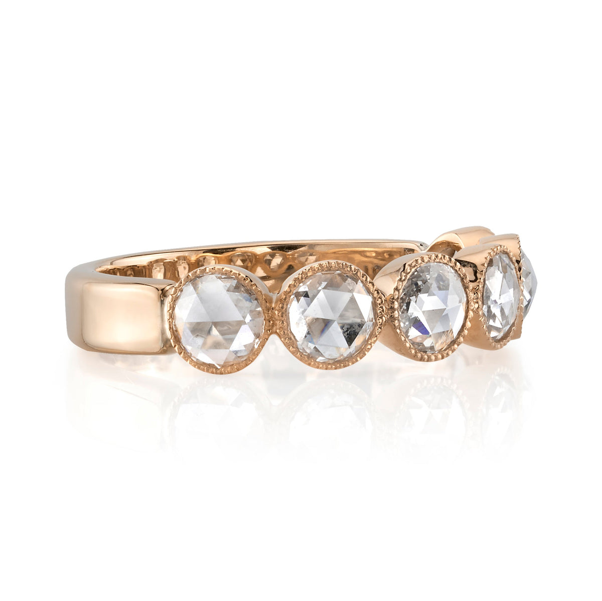 SINGLE STONE LARGE ROSE CUT GABBY HALF BAND BAND | Approximately 0.90ctw rose cut diamonds set in a handcrafted bezel set half-eternity band. Approximate band width 4.8mm. Please inquire for additional customization.