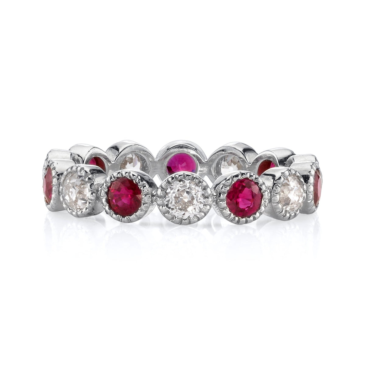 SINGLE STONE MEDIUM GABBY WITH DIAMONDS AND GEMSTONES BAND | Approximately 0.95ctw G-H/VS-SI old European cut diamonds and 1.20ctw round cut color gemstones set in a handcrafted bezel set eternity band. Approximate band width 3.6mm. Please inquire for add