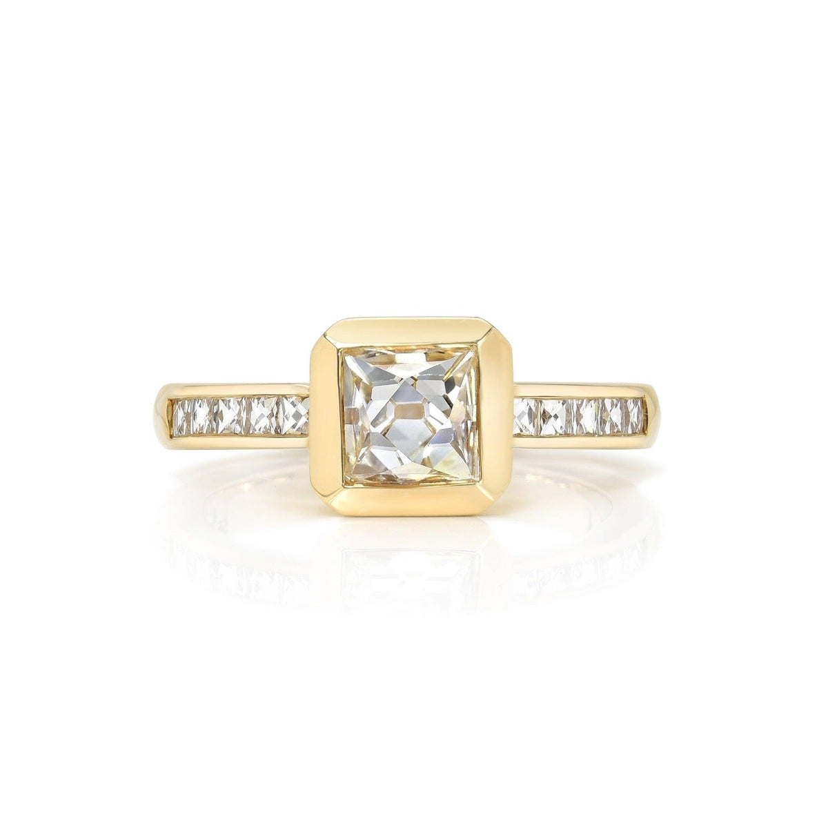 SINGLE STONE KARINA RING featuring 1.24ct G/I1 GIA certified French cut diamond with 0.40ctw French cut accent diamonds set in a handcrafted 18K yellow gold mounting.