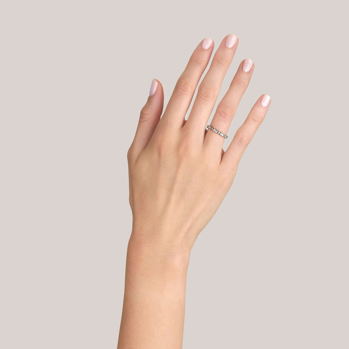SINGLE STONE MADELINE BAND | Approximately 0.80-1.00ctw square and rectangular French cut diamonds bezel set in a handcrafted eternity band. Approximate band width 2.4mm. *Stone weight may vary from piece to piece. Please inquire for additional customizat