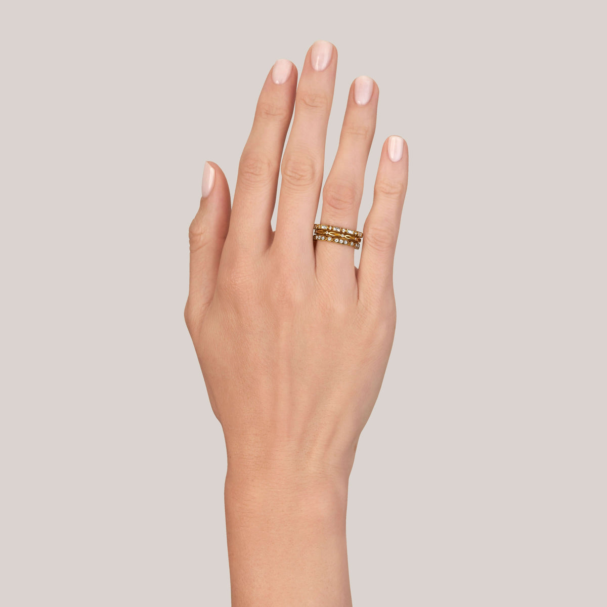 SINGLE STONE MADELINE BAND | Approximately 0.80-1.00ctw square and rectangular French cut diamonds bezel set in a handcrafted eternity band. Approximate band width 2.4mm. *Stone weight may vary from piece to piece. Please inquire for additional customizat