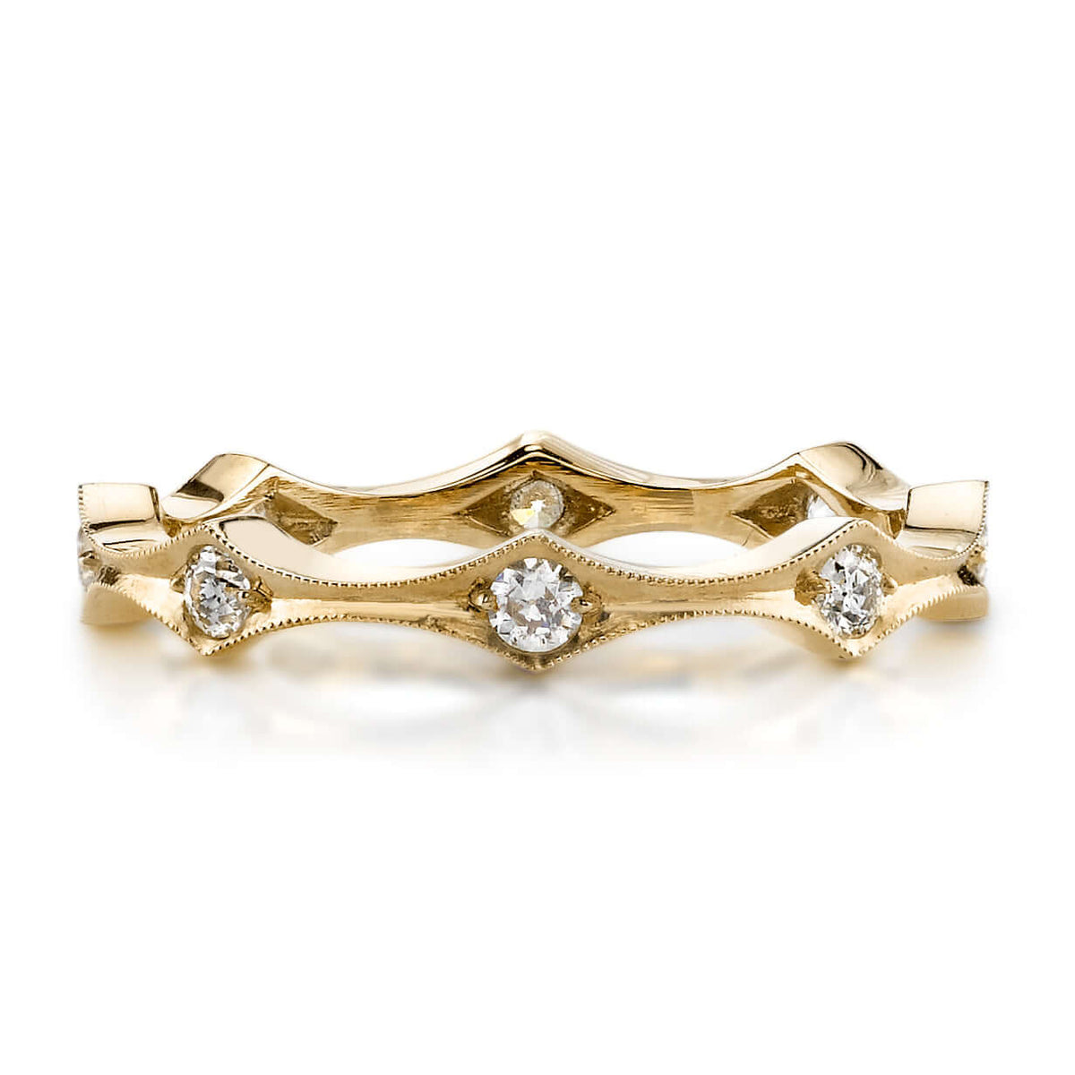 SINGLE STONE DIANA BAND | Approximately 0.50ctw old European cut diamonds set in a handcrafted eternity band. Approximate band width 3mm. Please inquire for additional customization.