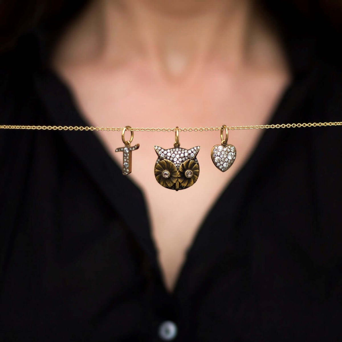 SINGLE STONE PAVE OWL CHARM PENDANT featuring Approximately 0.70ctw G-H/VS old European cut diamonds and 0.10ctw rose cut diamonds set in a handcrafted oxidized 18K yellow gold owl charm. Price does not include chain.