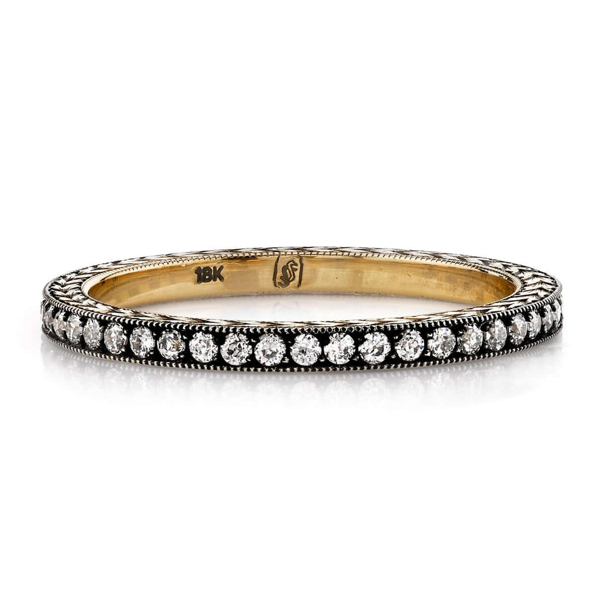 SINGLE STONE MOLLY BAND | Approximately 0.40ctw G-H/VS old European cut diamonds set in an handcrafted eternity band featuring engraved sidewalls. Approximate band with 1.6mm. Please inquire for additional customization.