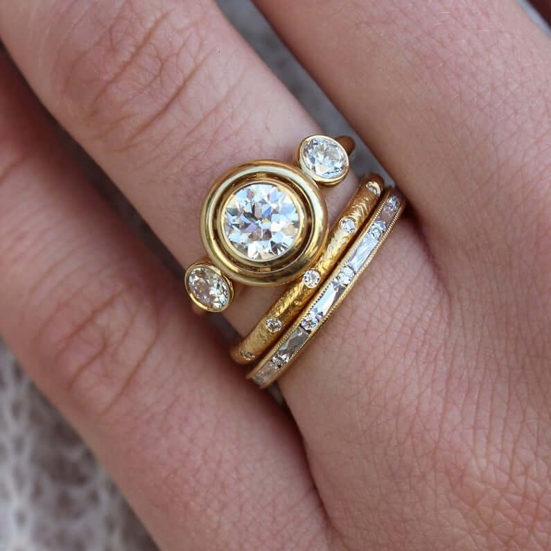 SINGLE STONE PAIGE BAND | Approximately 0.75ctw G-H/VS alternating French and old European cut diamonds channel set in a handcrafted eternity band. Approximate band with 2.1mm. Please inquire for additional customization.