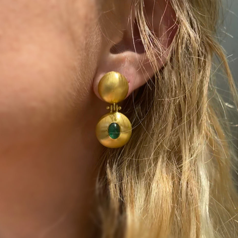 EMERALD DOUBLE DOME BULLA EARRINGS, 22k yellow gold
Cabochon emeralds
Made in New York
, Earrings, Prounis Jewelry