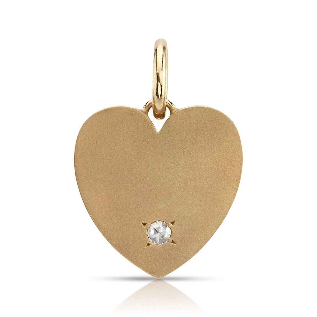 SINGLE STONE MINNIE WITH DIAMOND PENDANT featuring 0.08ctw H/SI rose cut diamond set in a handcrafted 18K yellow gold engravable heart shaped pendant. Charm measures 22mm x 21mm. Available in a polished or matte finish. Price does not include chain.