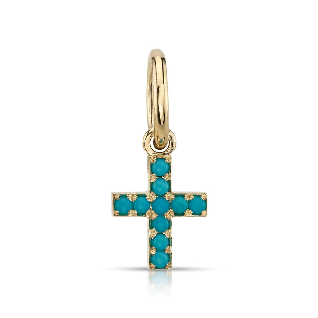SINGLE STONE MINI CARMELA CROSS WITH GEMSTONES PENDANT featuring Approximately 0.15ctw round cut gemstones prong set in a handcrafted 18K yellow gold cross. Cross measures 8.20mm x 9.80mm. Price does not include chain.