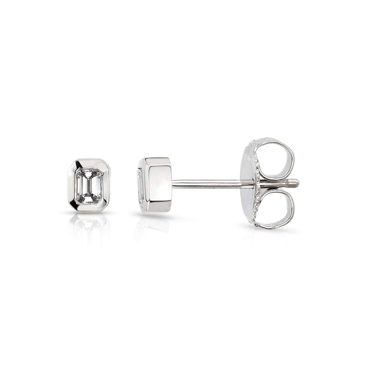 SINGLE STONE SIERRA STUDS | Earrings featuring Approximately 0.18ctw G-I/VS emerald cut diamonds bezel set in handcrafted stud earrings.