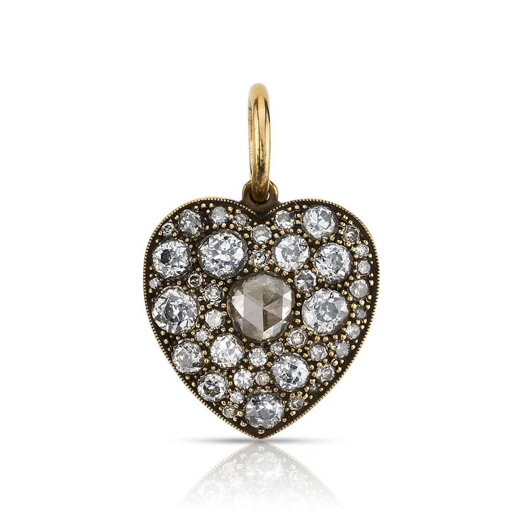 SINGLE STONE MEDIUM COBBLESTONE HEART PENDANT featuring 0.28ct G-H/I1 rose cut diamond with 1.77ctw varying old cut and round brilliant cut diamonds set in a handcrafted, oxidized 18K yellow gold heart pendant. Charm measures 17mm x 19mm. Price does not i