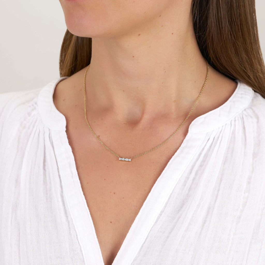 SINGLE STONE MONET NECKLACE featuring Approximately 0.40ctw G-H/VS French cut diamonds set in a handcrafted bar pendant. Necklace measures 17".