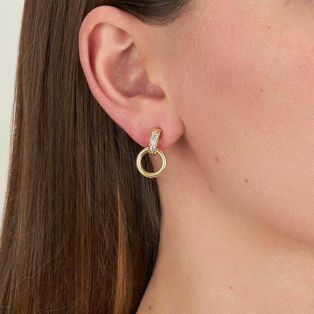 SINGLE STONE ASTRID HOOP | Earrings featuring Approximately 0.35ctw G-H/VS old European cut diamonds prong set in 18K yellow gold hoop earrings.