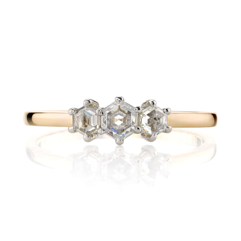 SINGLE STONE QUINCY RING featuring 0.42ctw hexagonal rose cut diamonds set in a handcrafted 18K yellow gold and platinum three stone mounting.