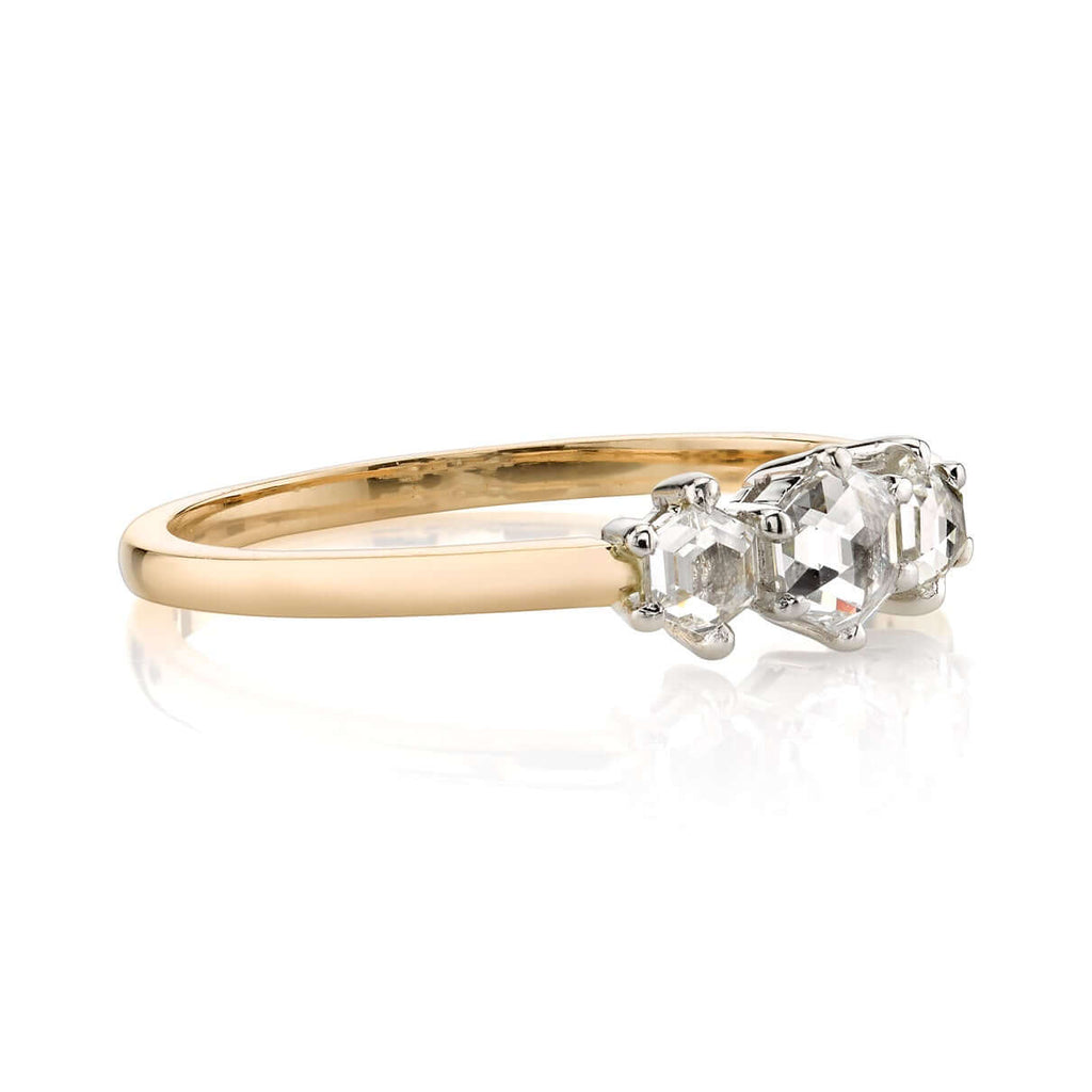 SINGLE STONE QUINCY RING featuring 0.42ctw hexagonal rose cut diamonds set in a handcrafted 18K yellow gold and platinum three stone mounting.
