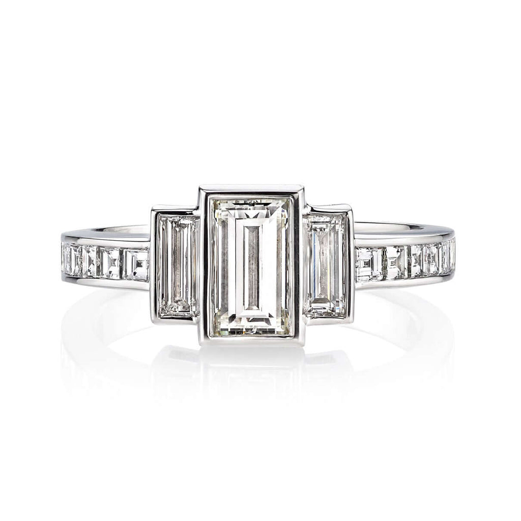 SINGLE STONE LISA RING featuring 0.88ct L/VS1 GIA certified rectangular step cut diamond with 0.72ctw mixed cut accent diamonds set in a handcrafted platinum mounting.