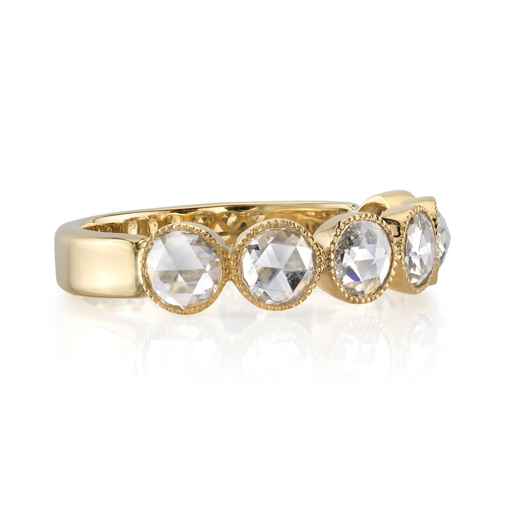 SINGLE STONE LARGE ROSE CUT GABBY HALF BAND BAND | ﻿Approximately 0.90ctw rose cut diamonds set in a handcrafted bezel set half-eternity band. Approximate band width 4.8mm. Please inquire for additional customization.