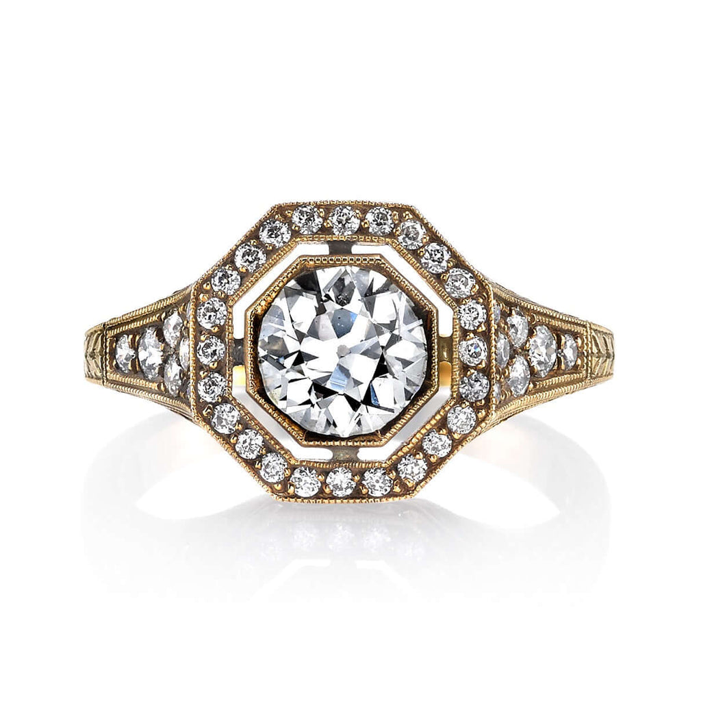 SINGLE STONE MCKENNA RING featuring 0.97ct J/SI2 EGL certified old European cut diamond with 0.36ctw old European cut accent diamonds set in a handcrafted oxidized 18K yellow gold mounting.
