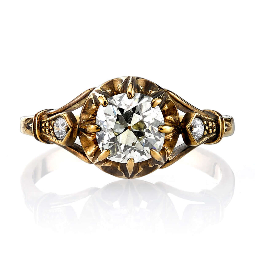 SINGLE STONE CLEO RING featuring 1.07ct L/SI1 EGL certified antique cushion cut diamond with 0.06ctw old European cut accent diamonds set in a handcrafted oxidized 18K yellow gold mounting.