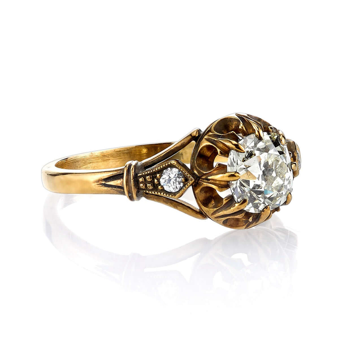 SINGLE STONE CLEO RING featuring 1.07ct L/SI1 EGL certified antique cushion cut diamond with 0.06ctw old European cut accent diamonds set in a handcrafted oxidized 18K yellow gold mounting.