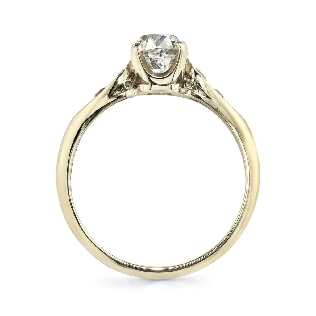 SINGLE STONE AMANDA RING featuring 1.12ct H/VS2 EGL certified antique cushion cut diamond with 0.22ctw old European cut accent diamonds set in a handcrafted 18K champagne gold mounting.