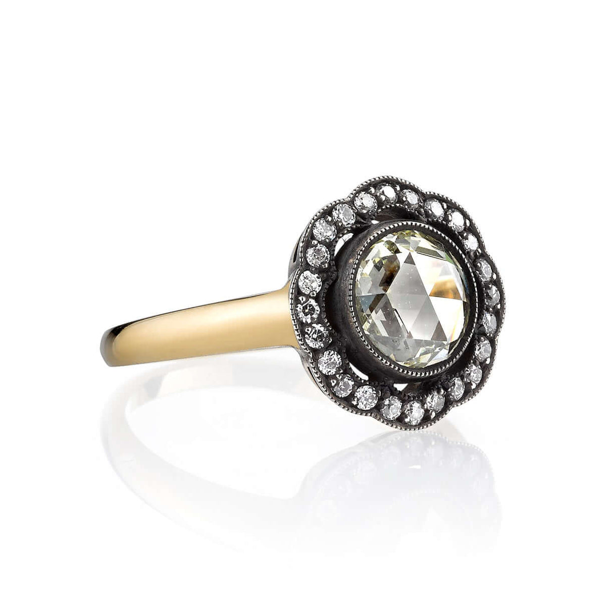 SINGLE STONE CHARLEY RING featuring 1.17ct M/VS rose cut diamond with 0.22ctw old European cut accent diamonds set in a handcrafted 18K yellow gold and oxidized silver mounting.