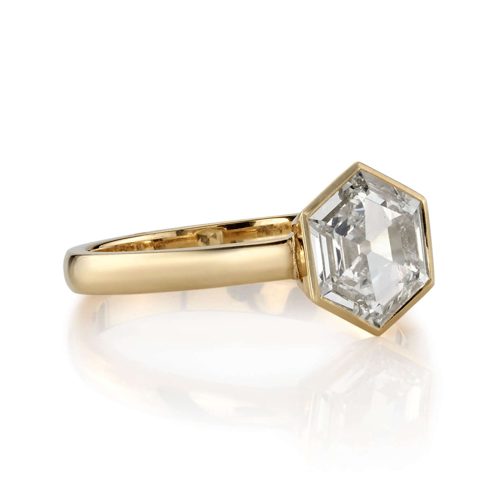 SINGLE STONE WYLER RING featuring 1.18ct L/VS2 GIA certified hexagonal cut diamond set in a handcrafted 18K yellow gold mounting.