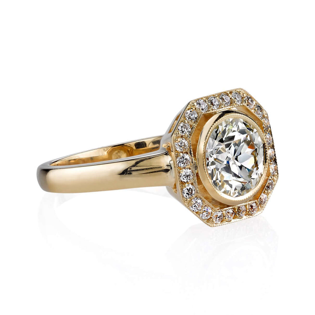 SINGLE STONE PARKER RING featuring 1.33ct L/VS1 GIA certified old European cut diamond with 0.19ctw old European cut accent diamonds set in a handcrafted 18K yellow gold mounting.