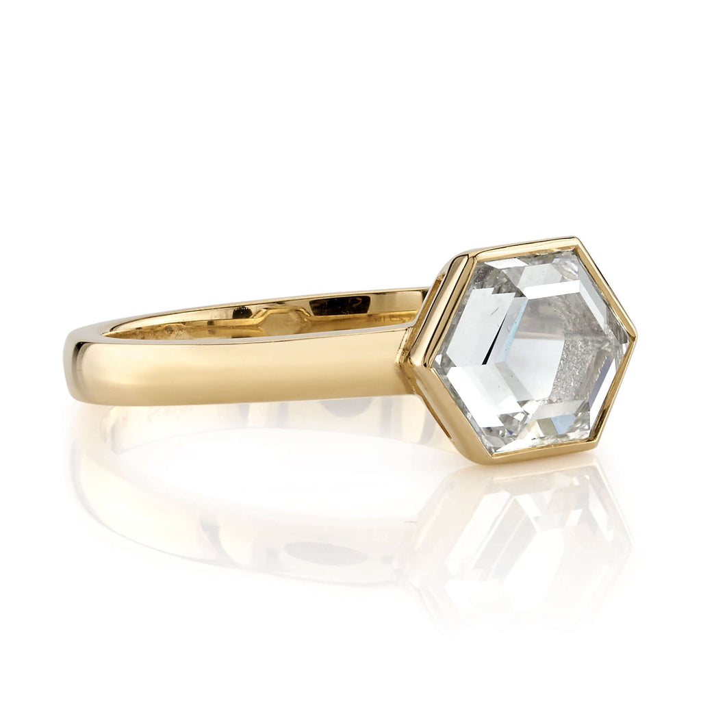 SINGLE STONE WYLER RING featuring 1.47ct K/VS2 GIA certified hexagonal portrait cut diamond set in a handcrafted 18K yellow gold mounting.