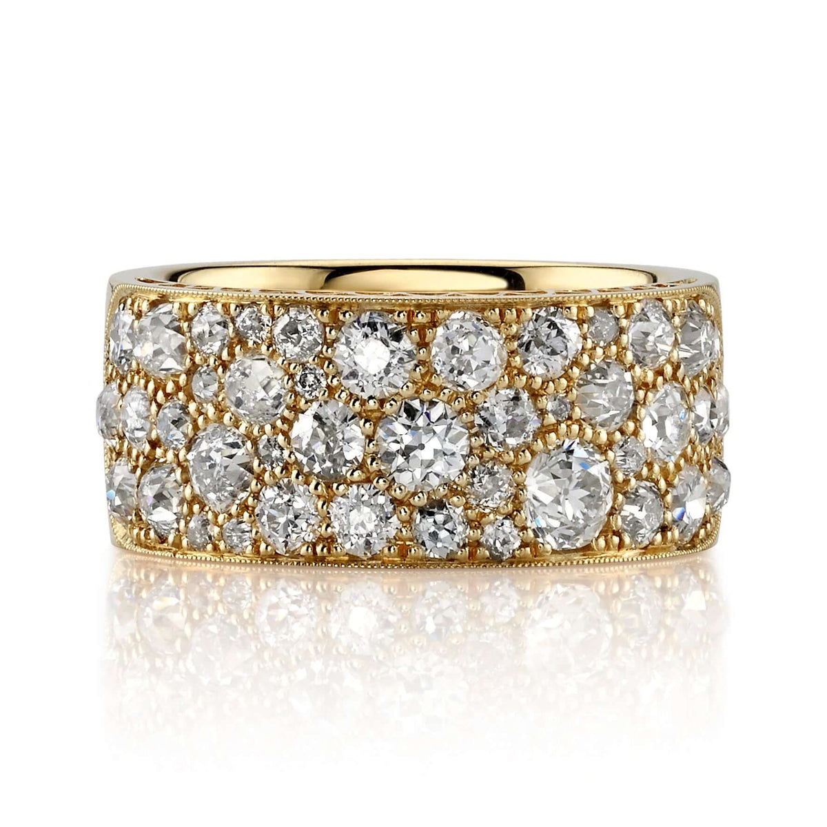 SINGLE STONE COBBLESTONE BAND BAND | Approximately 2.25ctw varying old cut and round brilliant cut diamonds set in a handcrafted 18K yellow gold band. Approximate band width 8.9mm. *Cobblestone pattern may vary from piece to piece Please inquire for addit