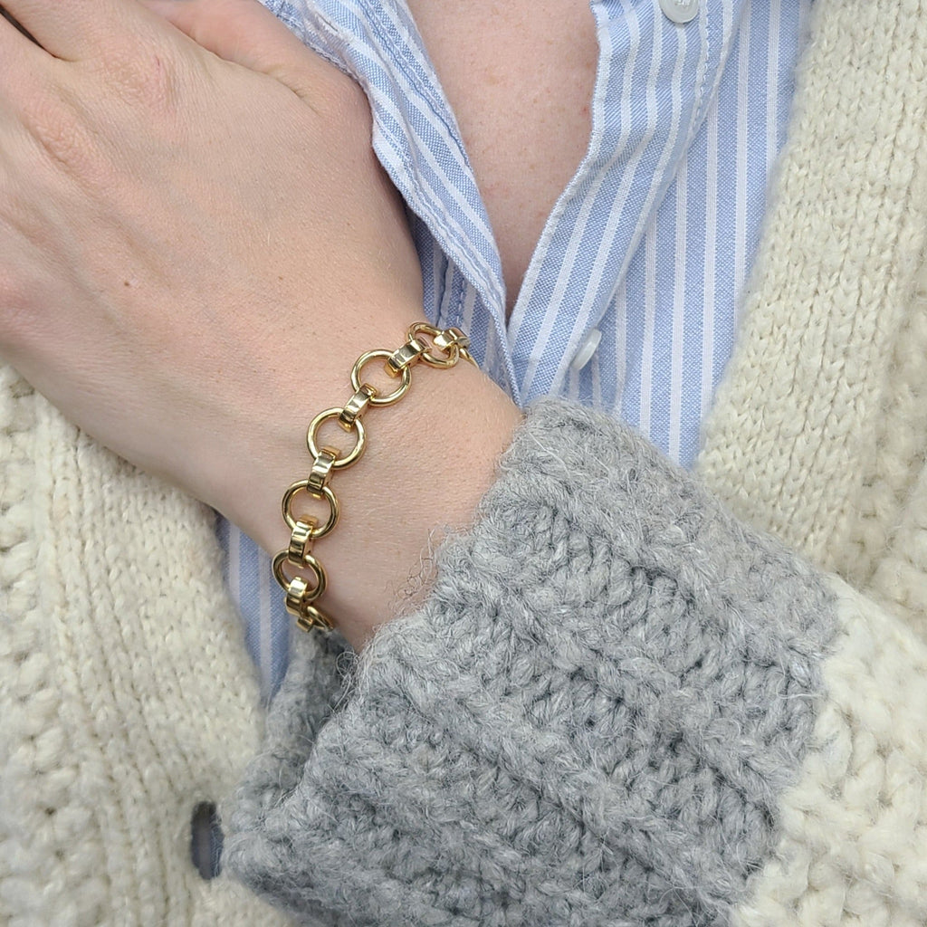 SINGLE STONE ASTRID BRACELET featuring Handcrafted 18K gold round and saddle-shaped link bracelet with hidden closure.