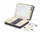 MARIA LARGE ZIP CASE, Material: Leather 
Storage: 10 ring rolls, 2 open compartments, 1 lidded compartment, 2 drawstring pouches,  6 necklace snap-on hooks with pocket, 1 ring bar, one earring bar. 
LusterLoc™: Allows the fabric lining the inside of your jewellery cases to absorb the hostile gases known to cause tarnishing. Under typical storage conditions, it can prevent tarnishing for up to 35 years 

, Gifts, WOLF DESIGNS, INC
