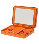 MARIA LARGE ZIP CASE, Material: Leather 
Storage: 10 ring rolls, 2 open compartments, 1 lidded compartment, 2 drawstring pouches,  6 necklace snap-on hooks with pocket, 1 ring bar, one earring bar. 
LusterLoc™: Allows the fabric lining the inside of your jewellery cases to absorb the hostile gases known to cause tarnishing. Under typical storage conditions, it can prevent tarnishing for up to 35 years 

, Gifts, WOLF DESIGNS, INC