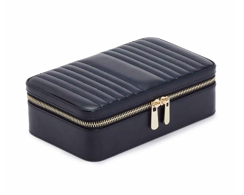 MARIA MEDIUM ZIP CASE, Material: Leather 
Storage: 1 earring tab, 1 ring tab, 1 zip pocket, double multi-purpose zip pouch with 4 storage compartments, 3 snap-on necklace hooks with pocket. 
LusterLoc™: Allows the fabric lining the inside of your jewellery cases to absorb the hostile gases known to cause tarnishing. Under typical storage conditions, it can prevent tarnishing for up to 35 years 

, Gifts, WOLF DESIGNS, INC