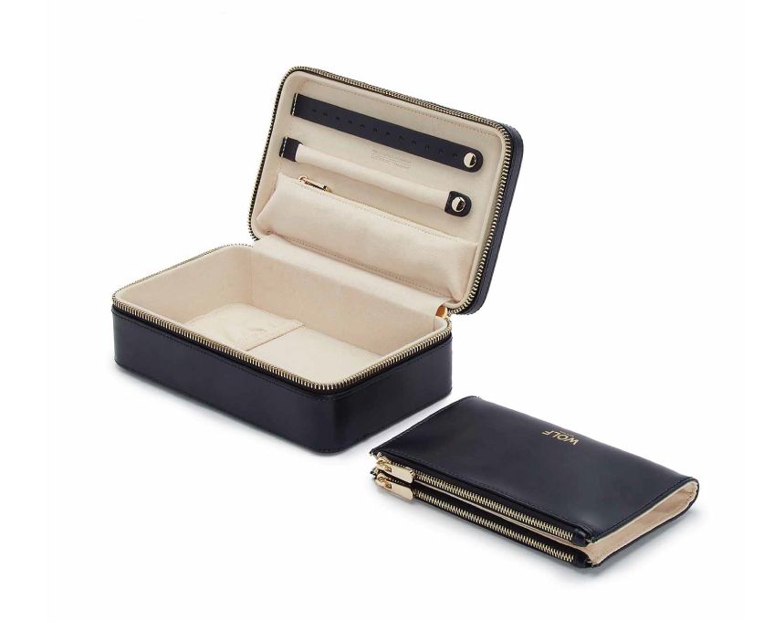 MARIA MEDIUM ZIP CASE, Material: Leather 
Storage: 1 earring tab, 1 ring tab, 1 zip pocket, double multi-purpose zip pouch with 4 storage compartments, 3 snap-on necklace hooks with pocket. 
LusterLoc™: Allows the fabric lining the inside of your jewellery cases to absorb the hostile gases known to cause tarnishing. Under typical storage conditions, it can prevent tarnishing for up to 35 years 

, Gifts, WOLF DESIGNS, INC