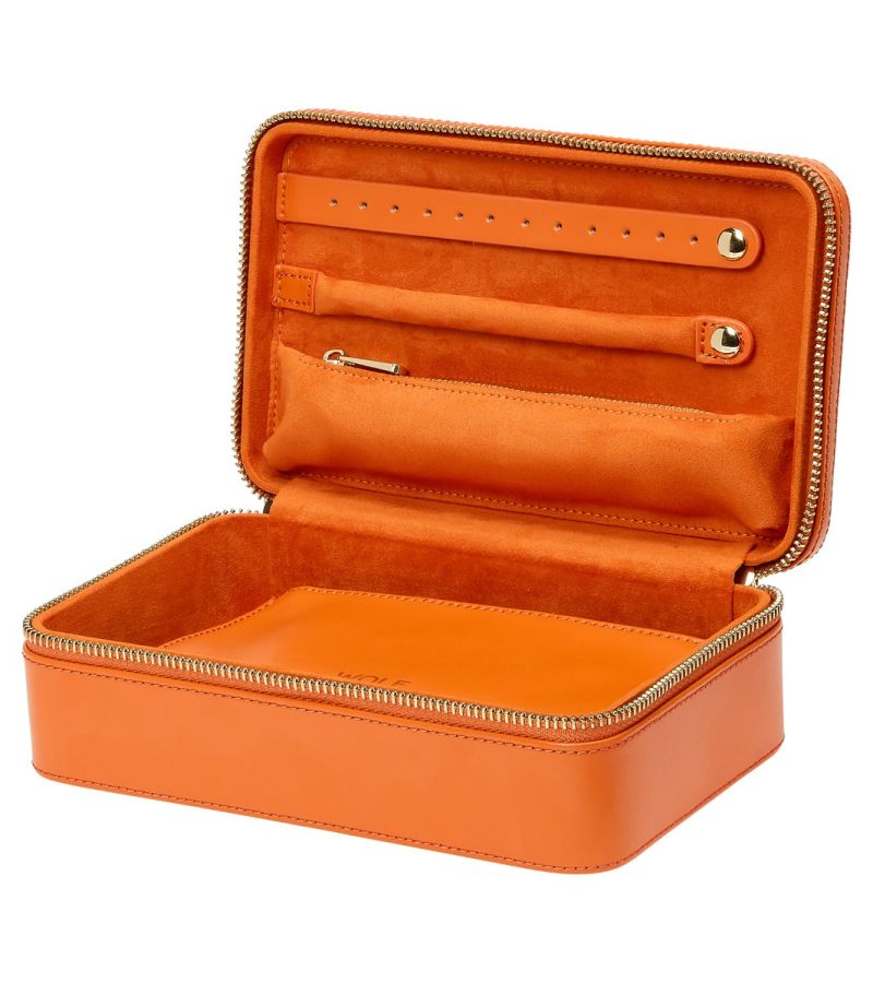 MARIA MEDIUM ZIP CASE, Material: Leather 
Storage: 1 earring tab, 1 ring tab, 1 zip pocket, double multi-purpose zip pouch with 4 storage compartments, 3 snap-on necklace hooks with pocket. 
LusterLoc™: Allows the fabric lining the inside of your jewellery cases to absorb the hostile gases known to cause tarnishing. Under typical storage conditions, it can prevent tarnishing for up to 35 years 

, Gifts, WOLF DESIGNS, INC
