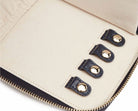 MARIA JEWELRY PORTFOLIO, Material: Leather 
Storage: 1 earring tab, 1 ring tab, 2 zip compartments, 4 snap-on necklace hooks with pocket 
LusterLoc™: Allows the fabric lining the inside of your jewellery cases to absorb the hostile gases known to cause tarnishing. Under typical storage conditions, it can prevent tarnishing for up to 35 years 
8.75" L X 5.25" W X 1.25" H 
, Gifts, WOLF DESIGNS, INC